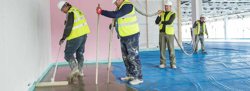 Proprietary Screed Being Pumped Across Large Floor Area